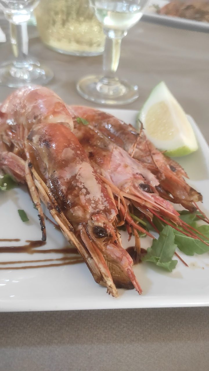 Gamberoni alla griglia con limone e rucola